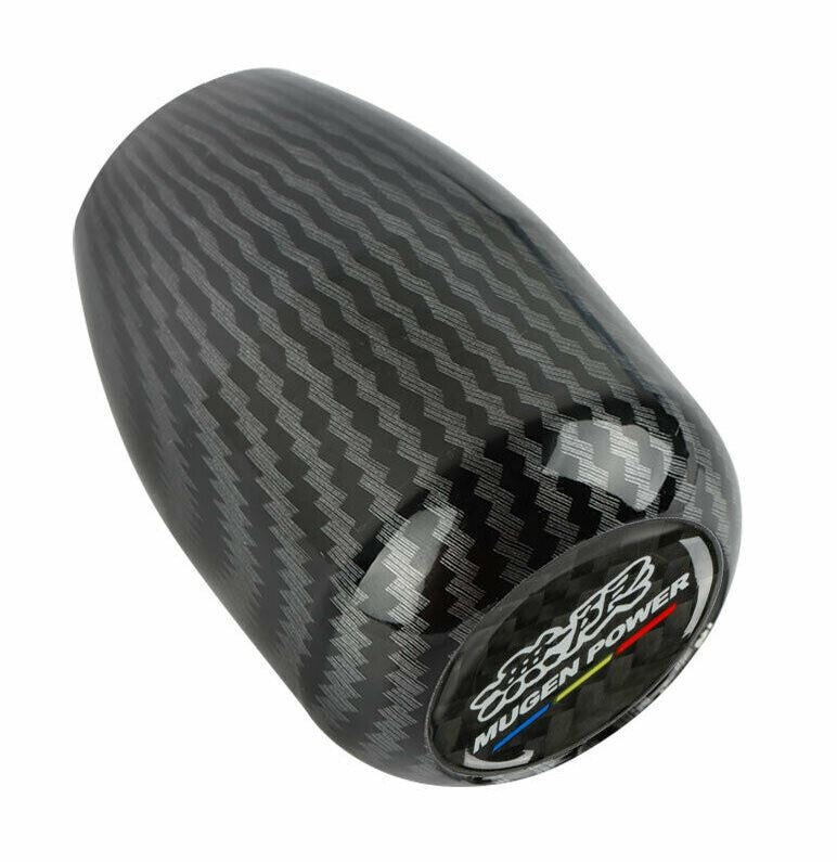 The Mugen carbon fiber exterior for manual shift levers is suitable for Honda for Civic and for Acura vehicles.