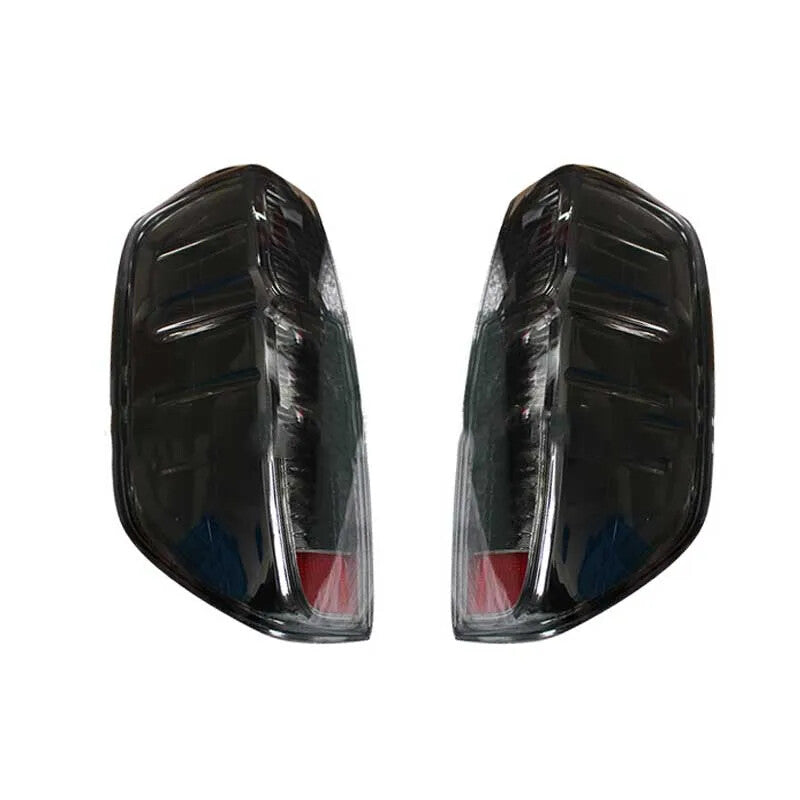 A pair of rear brake lights/taillights for Nissan Navara D40 2005-2015 (without bulbs).