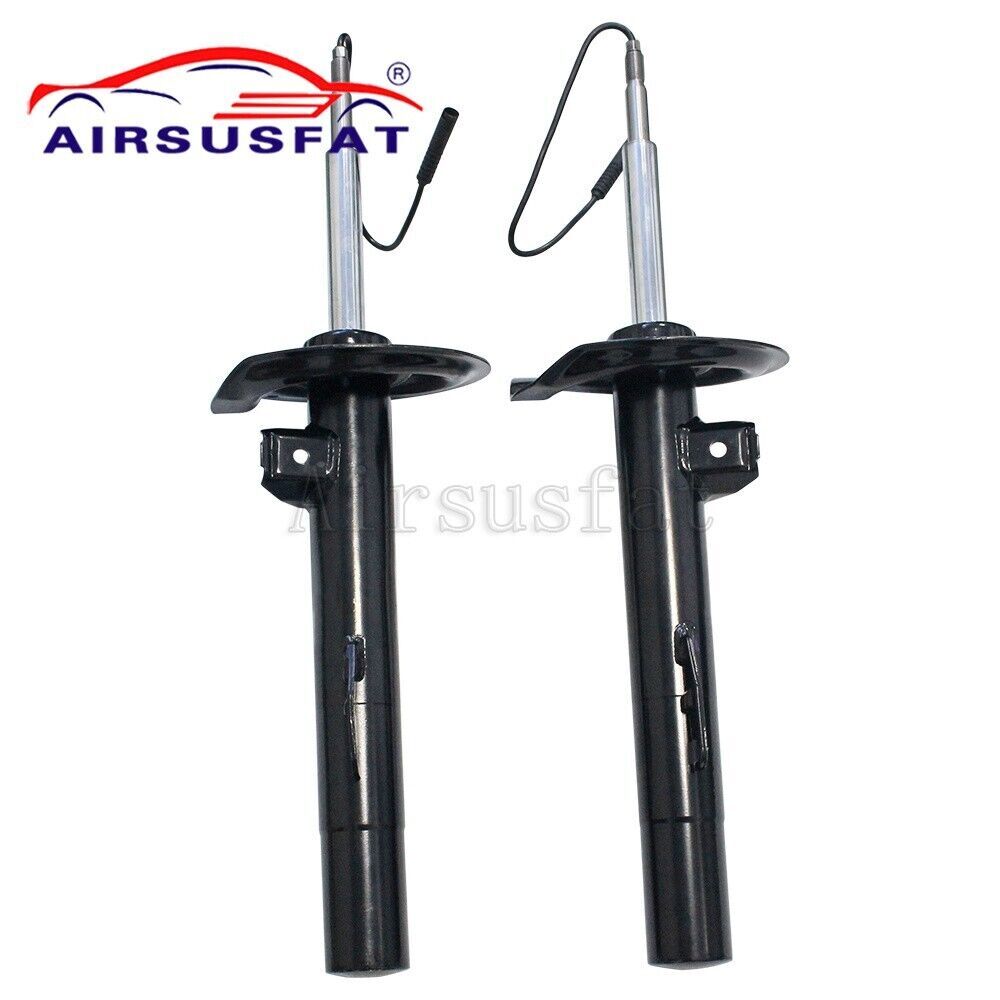 A pair of front suspension struts with EDC for BMW E38 740i, 740iL, and 750iL. new, 1995-2001.