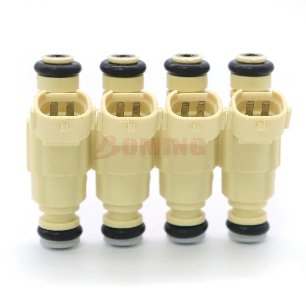 new 4-piece set of 35310-2B030 fuel injector nozzles for Hyundai and for Kia .