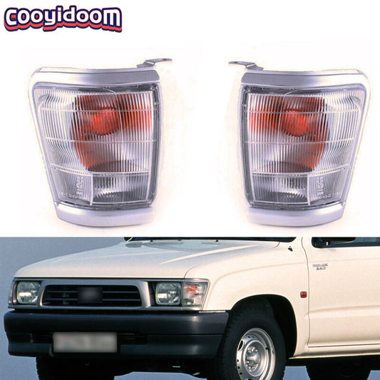 1 pair of headlight and turn signal light trim pieces for Toyota Hilux 1997-2001 vehicles.