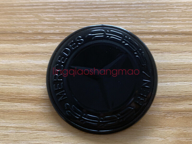 new for MERCEDES-BENZ MB WREATH FLAT BONNET in glossy black with embroidered badge A0008171701