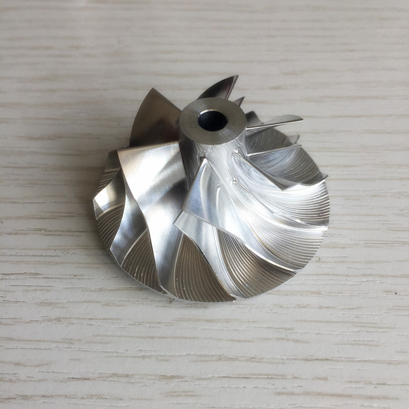 GT15-25 6+6 Blade 702489-0009/6/2 34.62/49.00 mm Turbine Billet Compressor Wheel