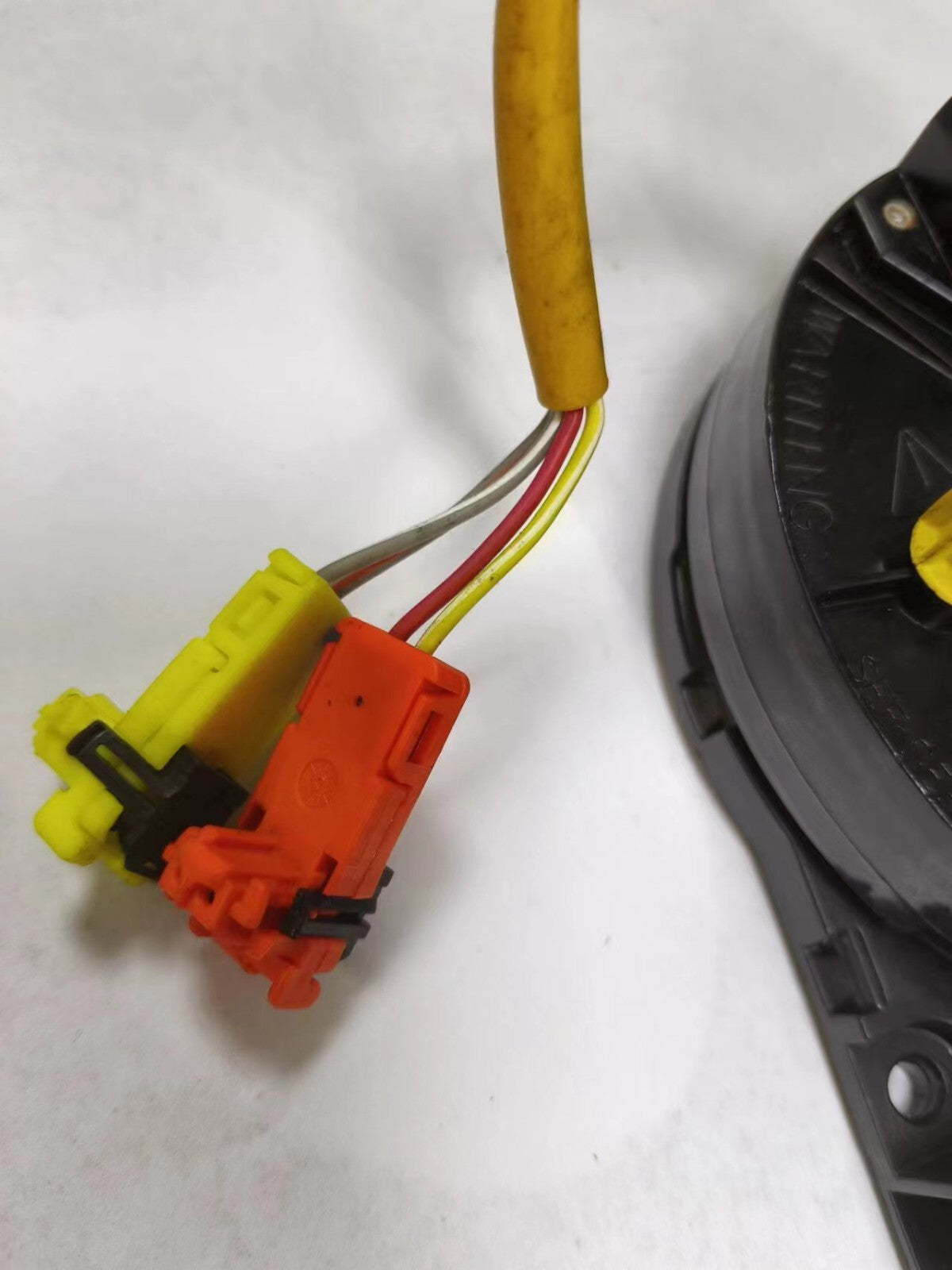 Steering wheel spiral cable clock spring BE5T-14A664-AB suitable for 10, 11, and 12 for Ford Fusion models.
