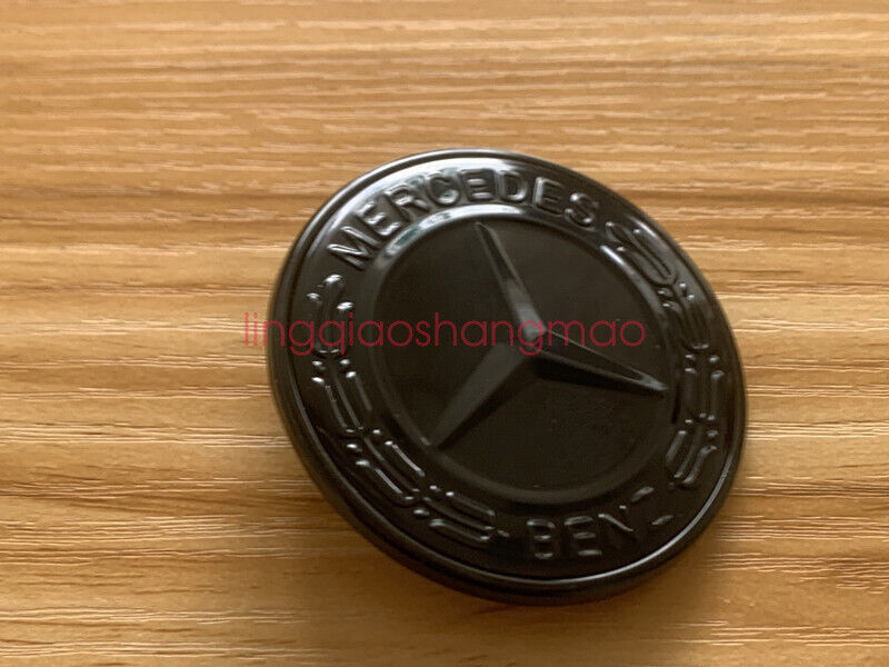 new for MERCEDES-BENZ MB WREATH FLAT BONNET in glossy black with embroidered badge A0008171701