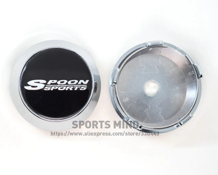 Brand new 4-piece set of 60mm spoon-shaped sport wheel caps, rim center caps, badges, and black chrome trim.