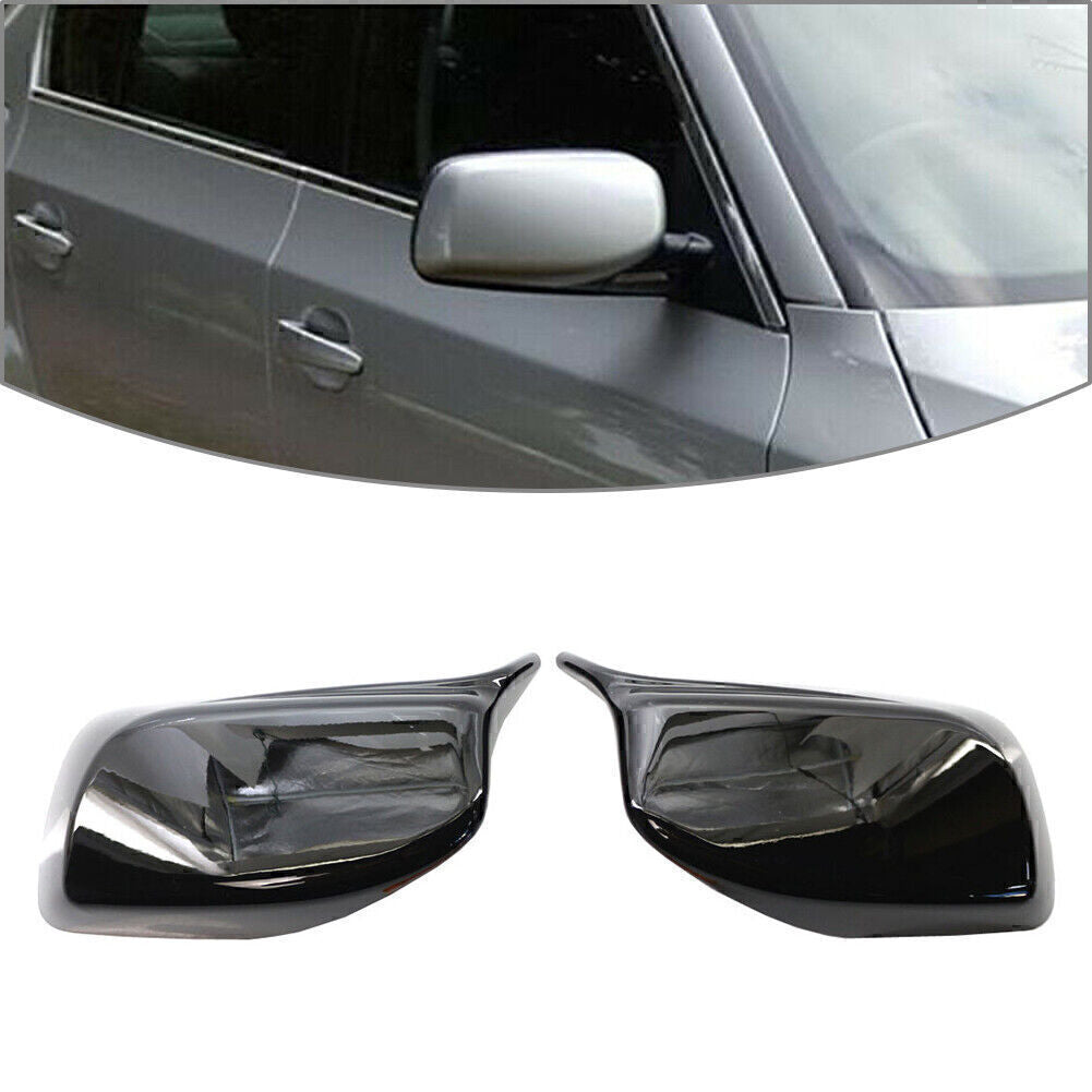 A pair of rearview mirror cover trims for BMW E60/E61 2004-2007 models, no removal tools required.